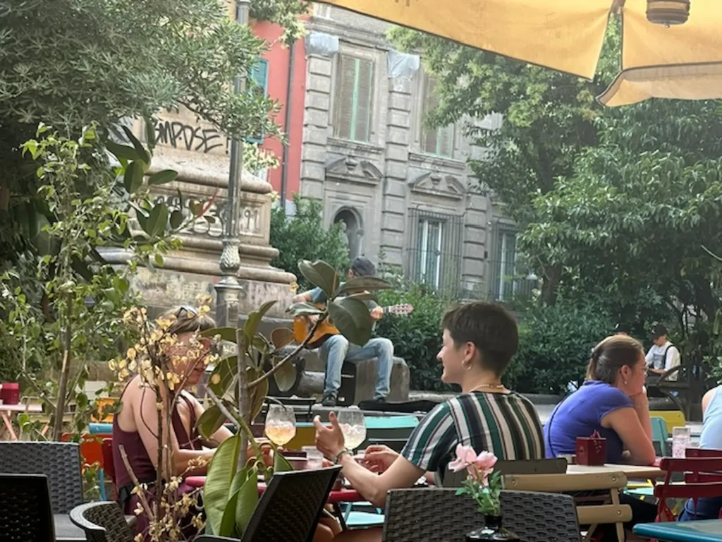 People eating at a restaurant in Rome, Italy.